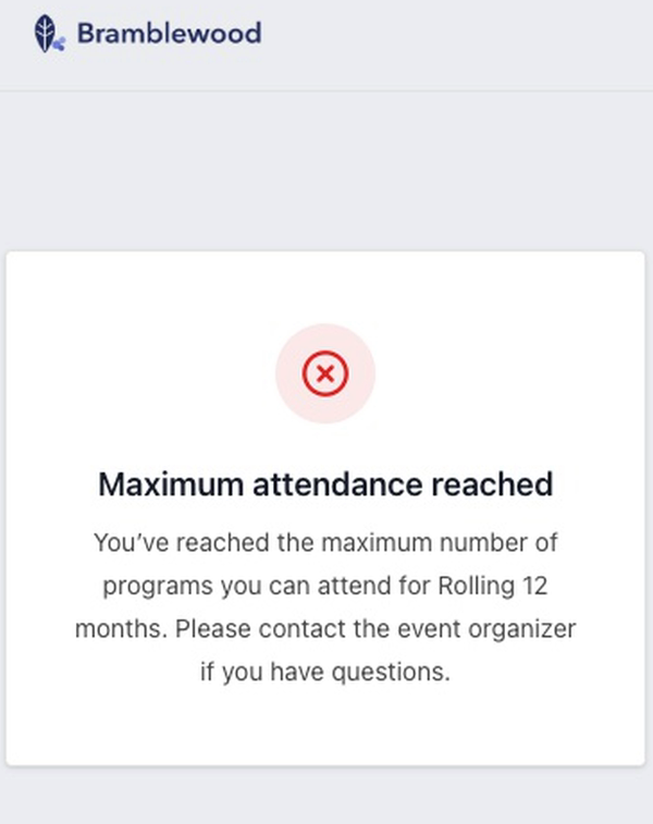 An HCP registering on a phone sees that the maximum attendance has been reached for a rolling 12 months.